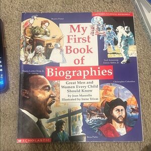 Scholastic Biographies Book with Red and Blue Cover